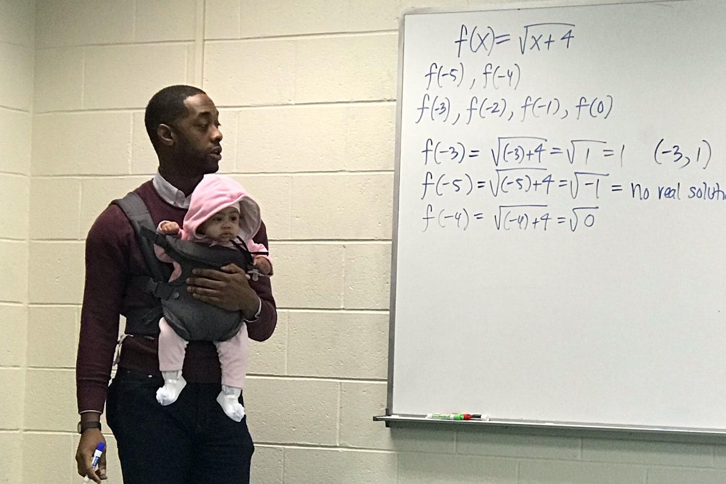 Morehouse Professor Holds Student’s Baby During Class so Father Can Take Good Notes