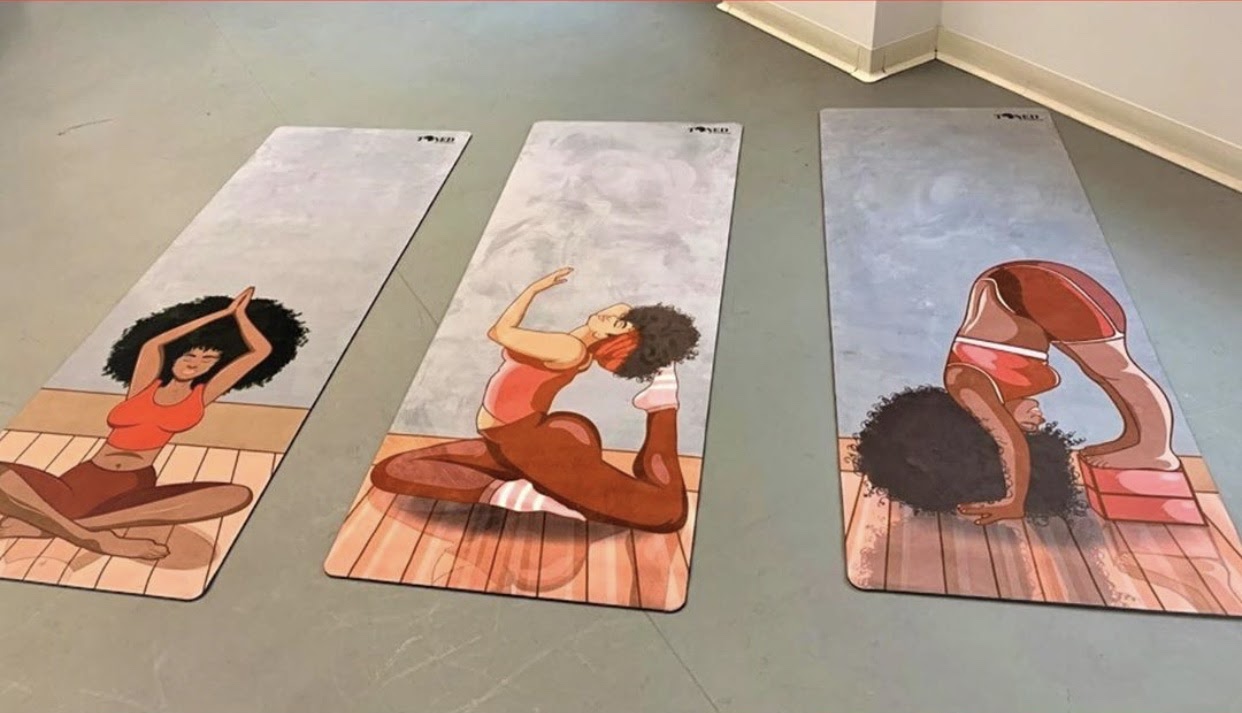 Two Sisters Are Changing The Face of Wellness With Yoga Mats Featuring Black Women