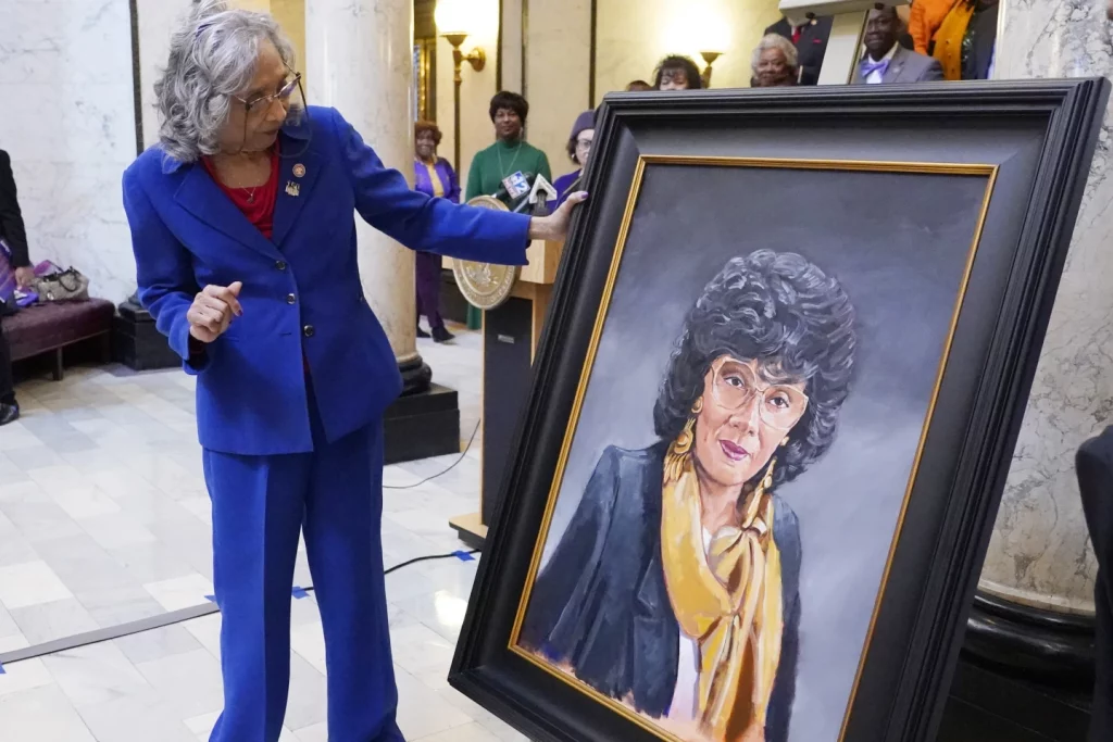 Cover photo: Alyce Clarke with painting/AP Photo/Rogelio V. Solis