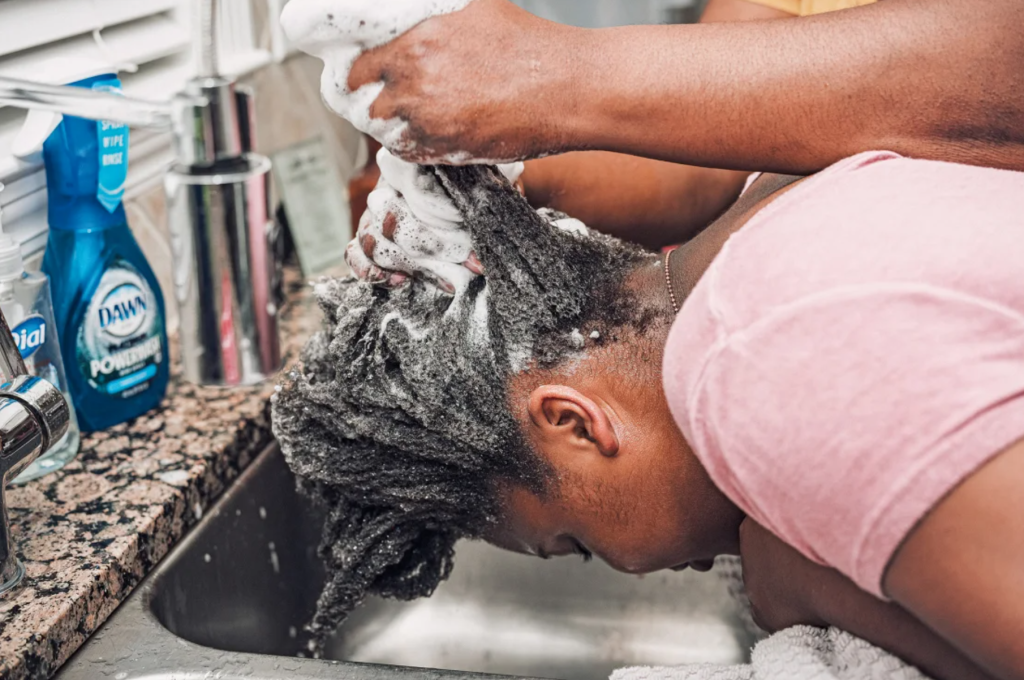 Cover Photo: New Photography Book Celebrates ‘Wash Day’ in Black Families (Photo credit: Tomesha Faxio/CNN)