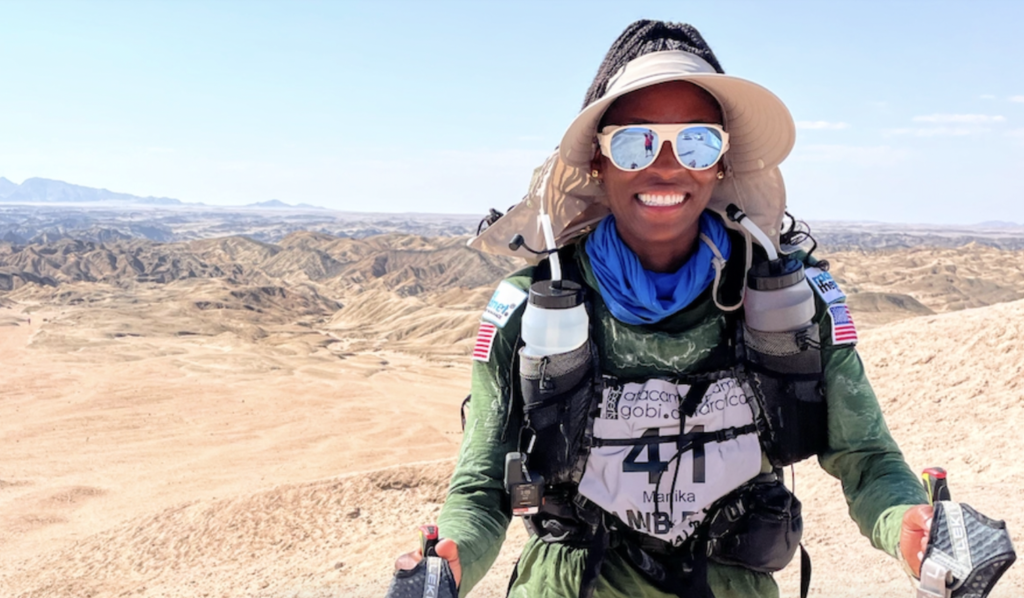 Cover Photo: Manika Gamble Makes History As First Black Woman To Run 155-Mile Race Through Oldest Desert In The World (Photo Credit: Manika Gamble)