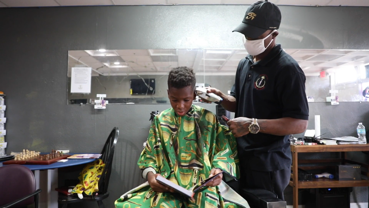 Black-Owned Barbershop Gives Free Haircuts to Children Who Enroll in Book Club