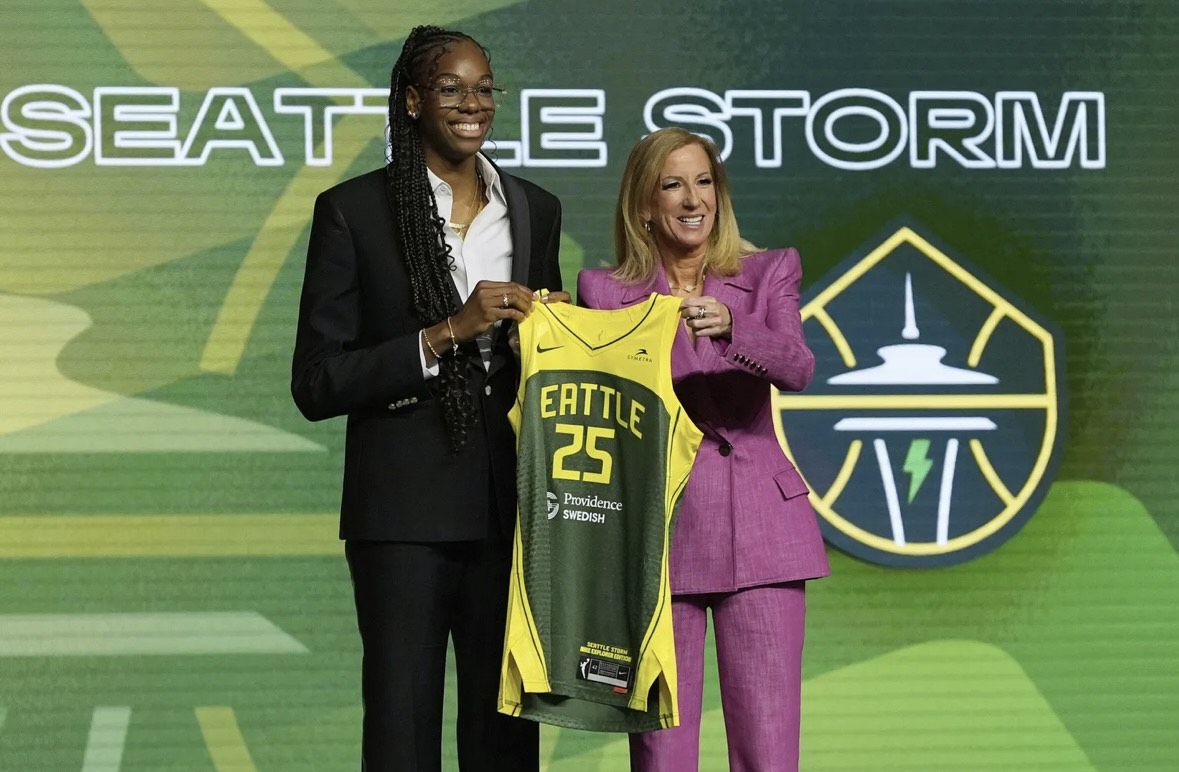 Dominique Malonga poses with WNBA Commissioner during 2025 WNBA Draft (Photo Credit: Pamela Smith/The Associated Press)